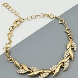 Gold Leaf Bracelet: An elegant bracelet featuring leaf-shaped